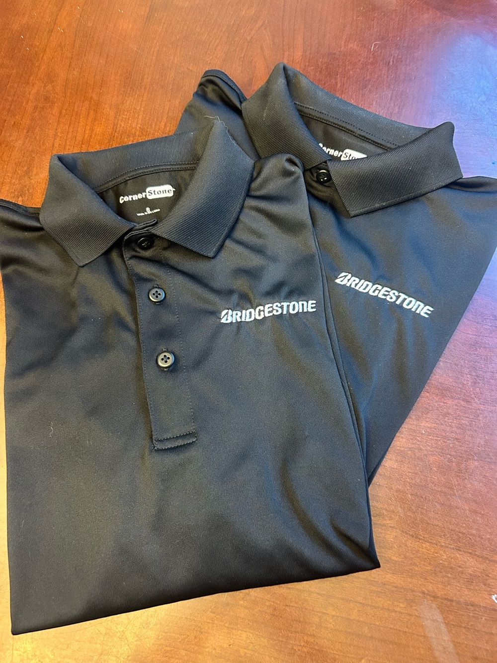 LOT of (2) Bridgestone Polo Shirts size small